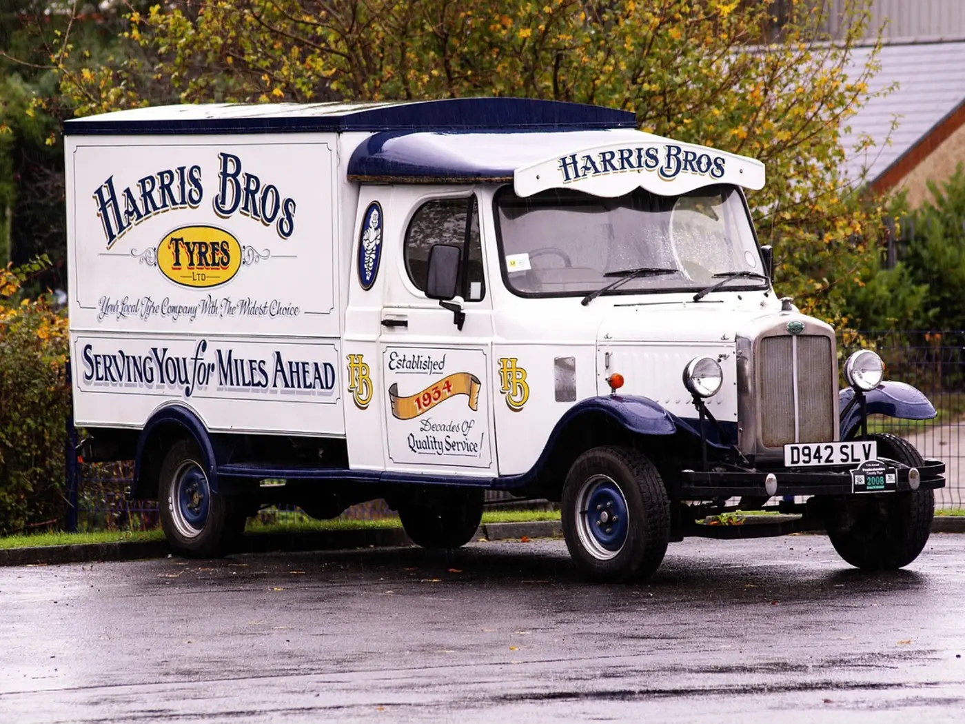 Commercial service truck covered with branded vehicle graphics